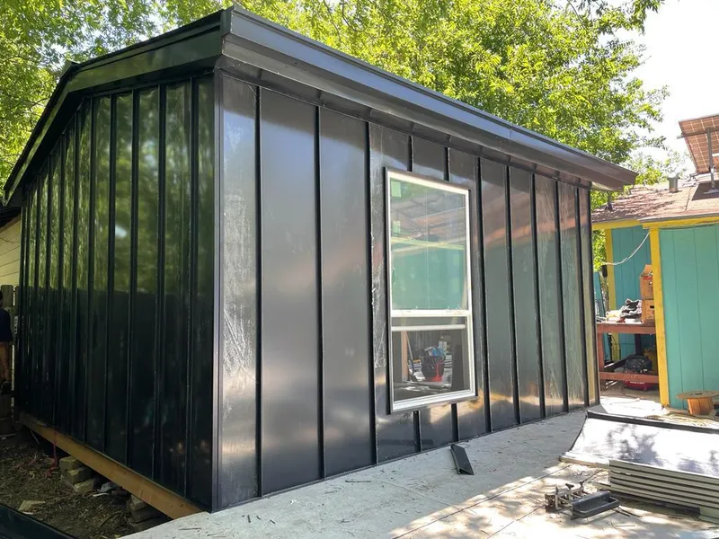 Black standing seam metal wall panels for Metal Roof Installation in Fairview